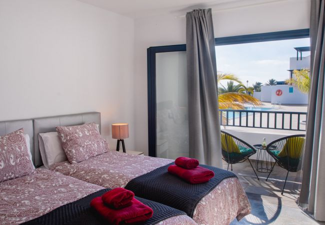 Maison à Playa Blanca - La niña bonita - villa au bord de la piscine avec vue sur la mer Maison à Playa Blanca - La niña bonita - villa au bord de la piscine avec vue sur la mer