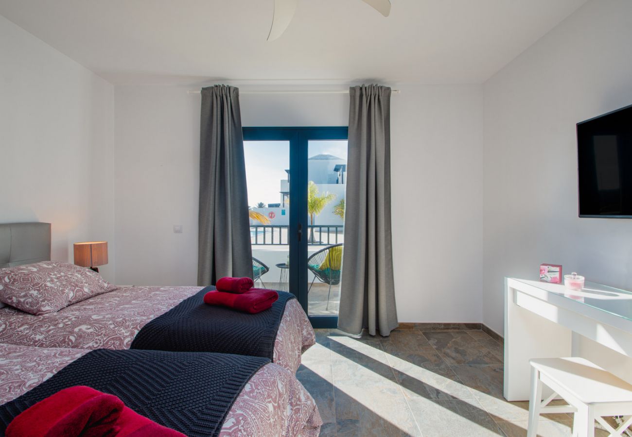 Maison à Playa Blanca - La niña bonita - villa au bord de la piscine avec vue sur la mer